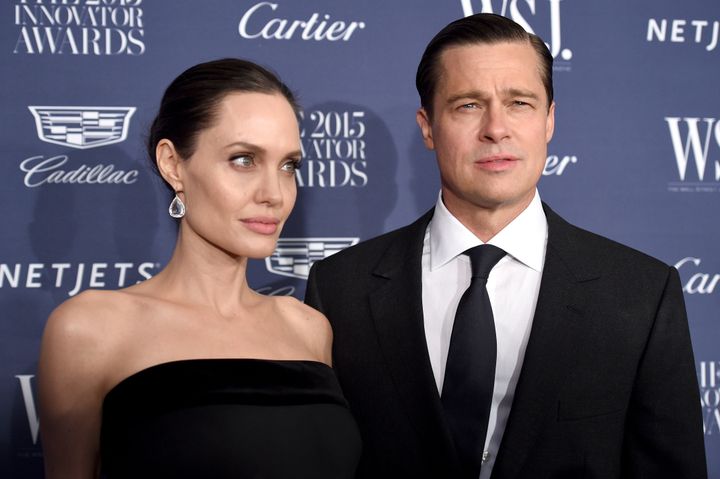 Angelina Jolie Pitt and Brad Pitt attend an event together a year before announcing their split. 