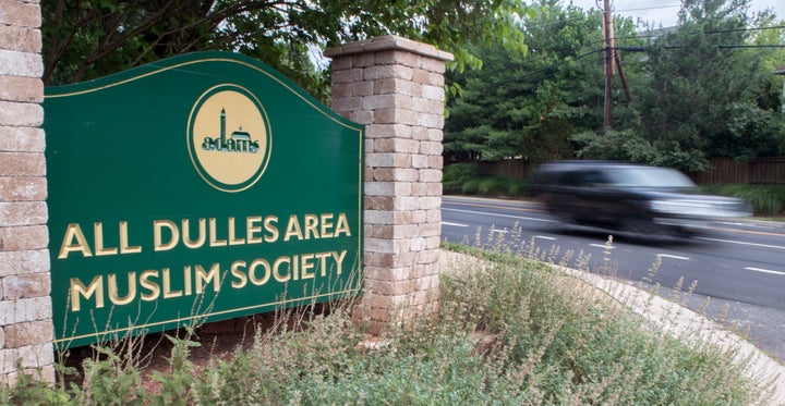 A car drives past the entrance to the All Dulles Area Muslim Society (ADAMS) on June 19, 2017, in Sterling, Virginia. A tight-knit Muslim community in the Virginia suburbs of Washington was grieving after a teenager was apparently assaulted and killed as she left a local mosque. Friends and worshippers at the mosque, known as the All Dulles Area Muslim Society, have identified the teen as 17-year-old Nabra Hassanen of Reston, who had disappeared for several hours Sunday.