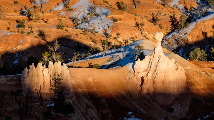 <em>The hoodoos as seen from Sunset Point under the glow of the falling sun. </em>