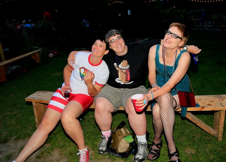<p>Elaine (far right) and friends at ‘Camp’ Camp’s annual Tea Dance.</p>