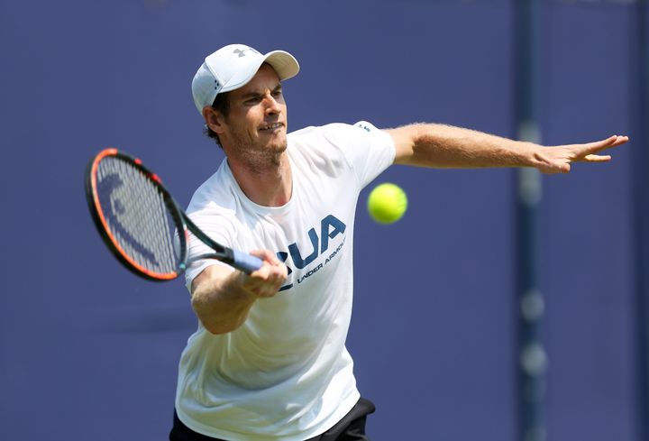 Andy Murray warms up during day one of Queen's