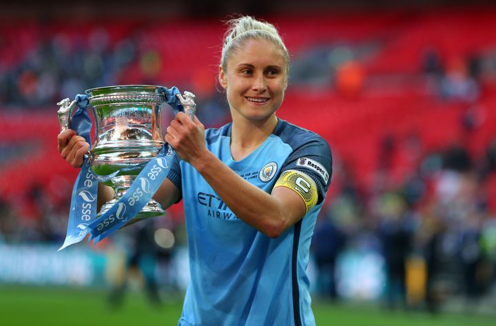 Steph Houghton of Manchester City Women with the trophy during the 2017 SSE Women's FA Cup Final.