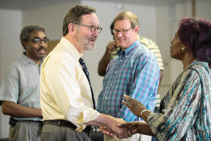 Democrat Archie Parnell, second from left, greets voters in Bishopville, South Carolina, on June 19, 2017.