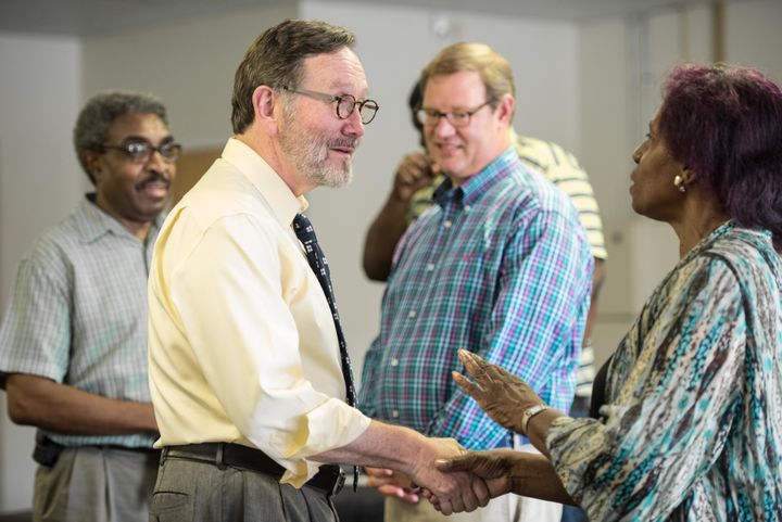 Democrat Archie Parnell, second from left, greets voters in Bishopville, South Carolina, on June 19, 2017.