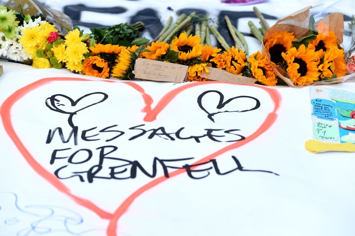 Messages left at a vigil for the victims of the fire.