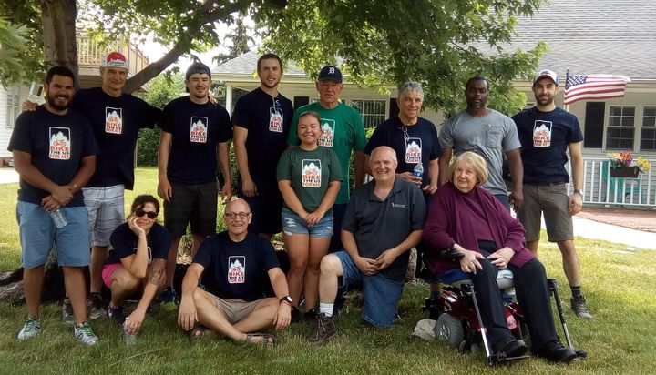 A few members of the 26 person Bike the US for MS team who also volunteered to do yard work & home improvements at two locations in Ohio for residents with MS. Here they pose with NCCH maintenance staff & one of the residents, Mary Namy.