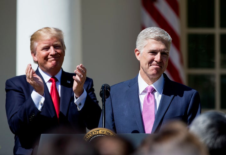 President Donald Trump celebrates his first confirmed judge, Neil Gorsuch, now on the Supreme Court.