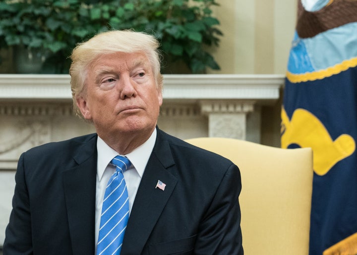 President Donald Trump looks on as he meets with Ukrainian President Petro Poroshenko in the Oval Office on June 20, 2017.