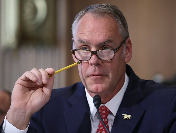 Interior Secretary Ryan Zinke listens to a question during a Senate Energy and Natural Resources Committee hearing on Capitol Hill on Tuesday. The committee heard testimony on President Donald Trump's proposed FY 2018 budget request for the Interior Department.