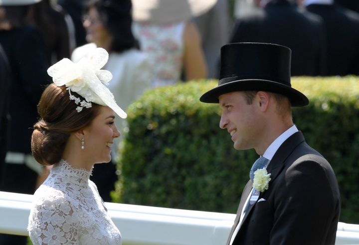 Duchess of Cambridge and Prince William chat together as they attend the first day of Royal Ascot 2017 at Ascot Racecourse on 20 June 2017 in Ascot, England.