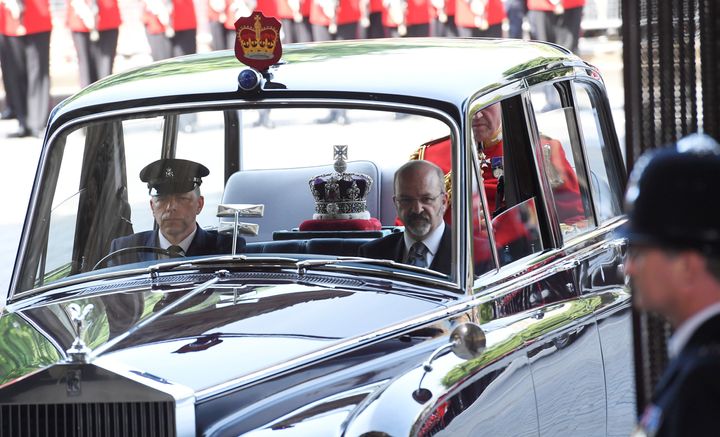 Hey, we seem to be missing someone? The crown arriving for the State Opening of Parliament