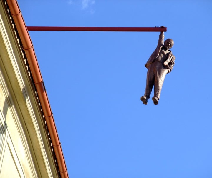  “Hanging Man” by David Cerny - Uncertainty about intellectualism in the 20th century. 