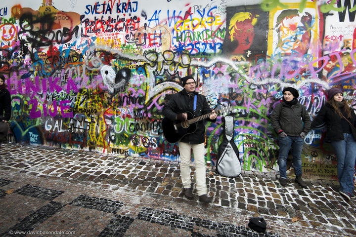  The John Lennon Wall in Prague, where some gather at dusk to sing and express their freedom. 