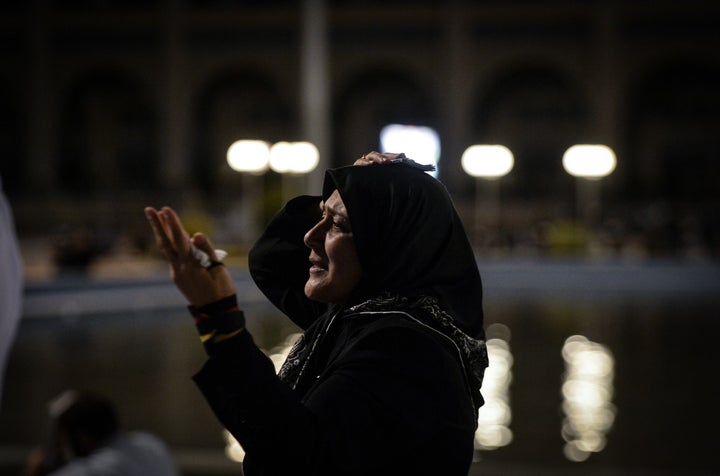 TEHRAN, IRAN - JUNE 16: Iranian worshipers pray at Mosalla Mosque on the 21th day of Ramadan on June 16, 2017. Iranian people assume that Laylat al-Qadr may fall on the 19th, 21st or 23rd days of Ramadan. They gather in mosques on these three nights and pray until the morning.