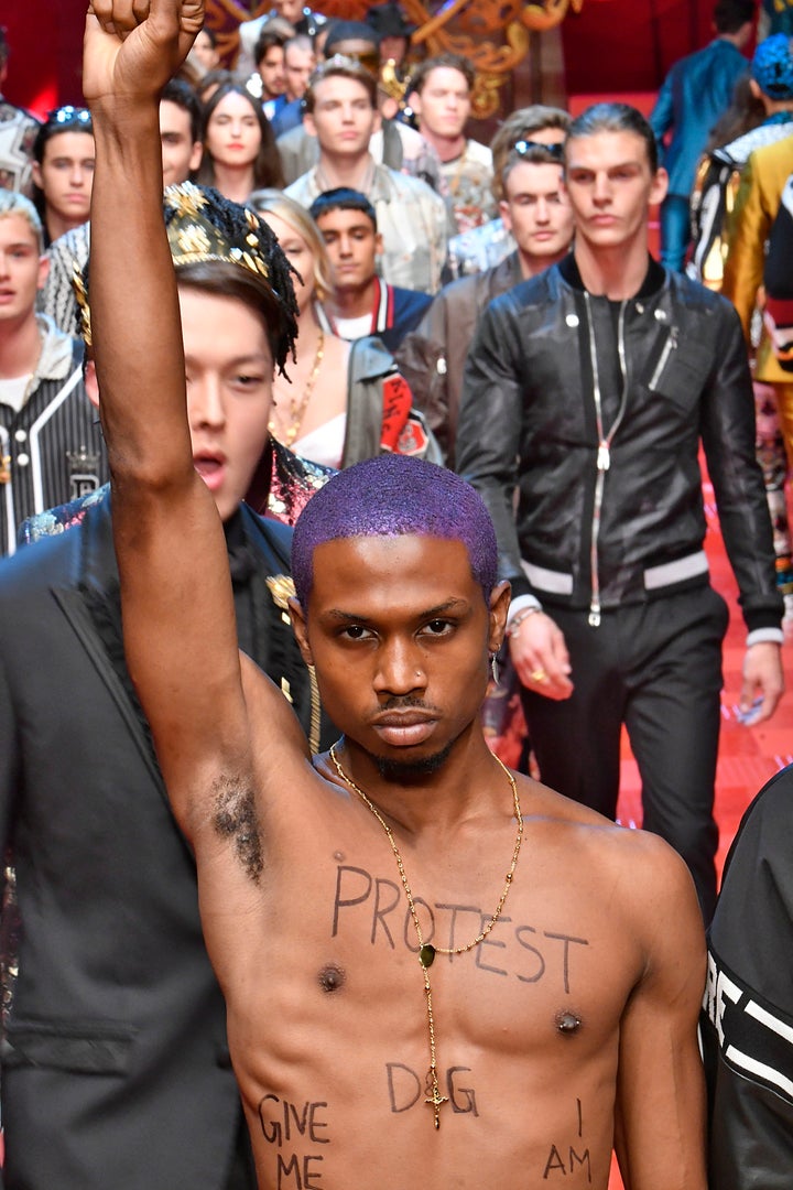 Raury on the runway at the Dolce & Gabbana show during Milan Men's Fashion Week Spring/Summer 2018 on June 17 in Milan, Italy. 