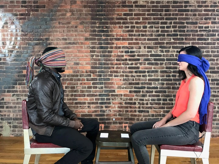 #FirstDate participants David and Michelle wearing blindfolds right before they see each other in person for the first time.