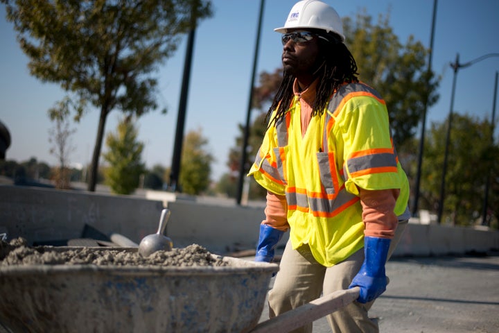 Malachi Yisrael at a construction site in Washington, D.C., after a protest in favor of an apprenticeship program that gives students an added skill in concrete inspection. Oct. 29, 2013.