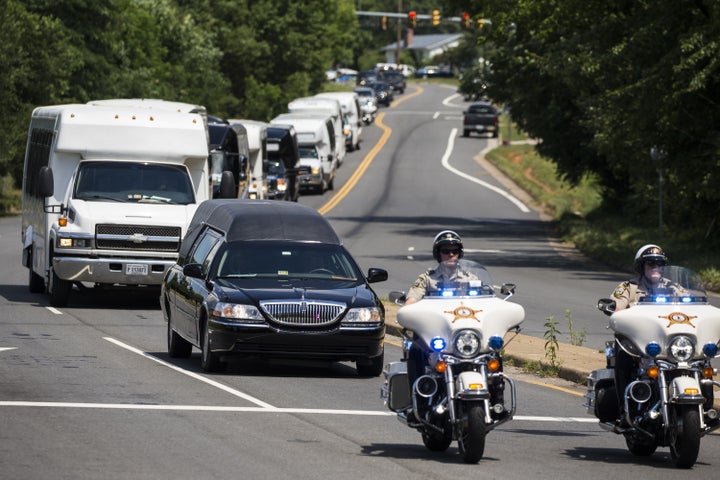 The hearse carrying Nabra Hassanen, who was killed Sunday on her way back to an overnight event at the All Dulles Area Muslim Society, arrives at the Sterling Cemetery where she will be laid to rest in Sterling, Virginia, on June 21.