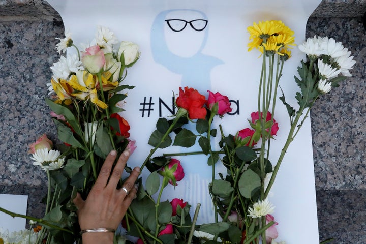 A mourner in New York City leaves flowers on June 20, 2017 for Nabra Hassanen, a teenage Muslim girl killed by a bat-wielding motorist near a Virginia mosque.