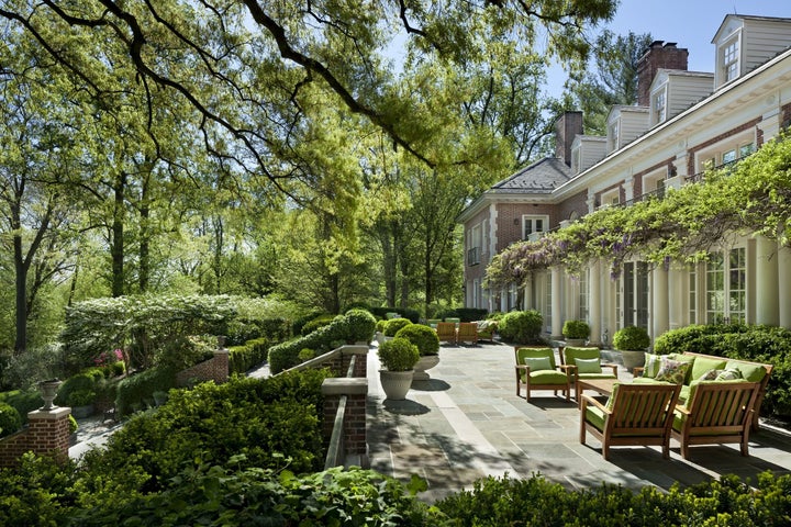 The formal gardens provide a perfect spot for "intimate al fresco dining." 