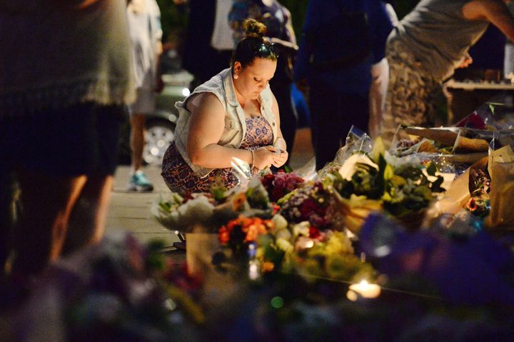 Tributes are left by Latymer Community Church, near to Grenfell Tower in west London.