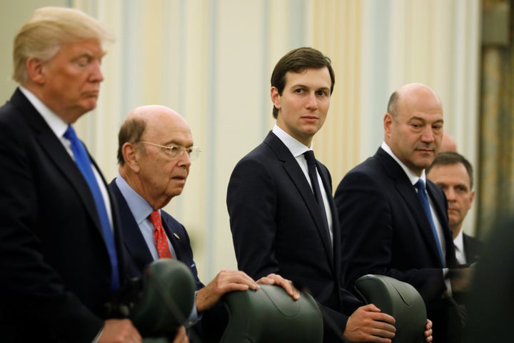 White House senior advisor Jared Kushner, center, with President Donald Trump and Commerce Secretary Wilbur Ross to his left and chief economic advisor Gary Cohn, right, as they prepare to meet the Saudi king in Riyadh, Saudi Arabia, in May.