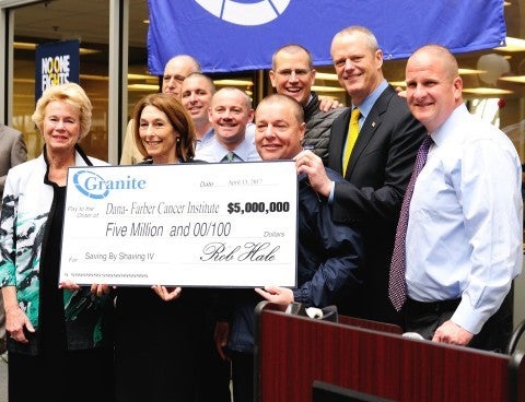 <strong>Granite Donates $5 Million More to Defeat Cancer (Rob Hale, Granite CEO on far right)</strong>