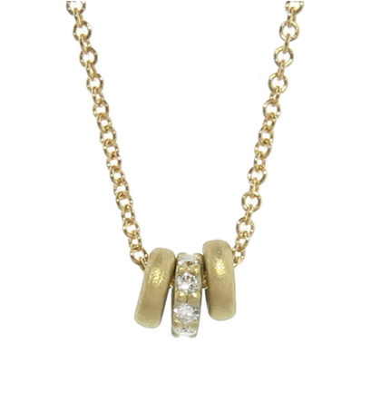 'Tiny donut necklace with diamonds,' $770