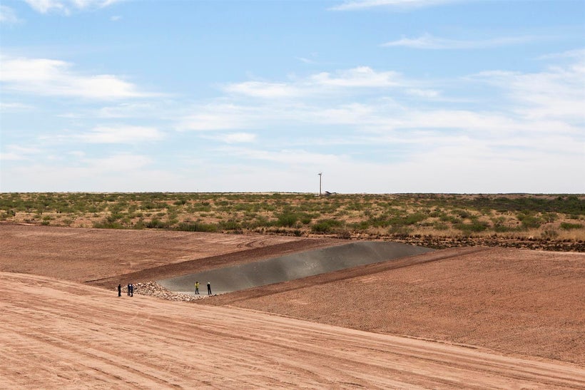 The Granite Construction Company, contractors on the project, tour the enormous entrance channel .