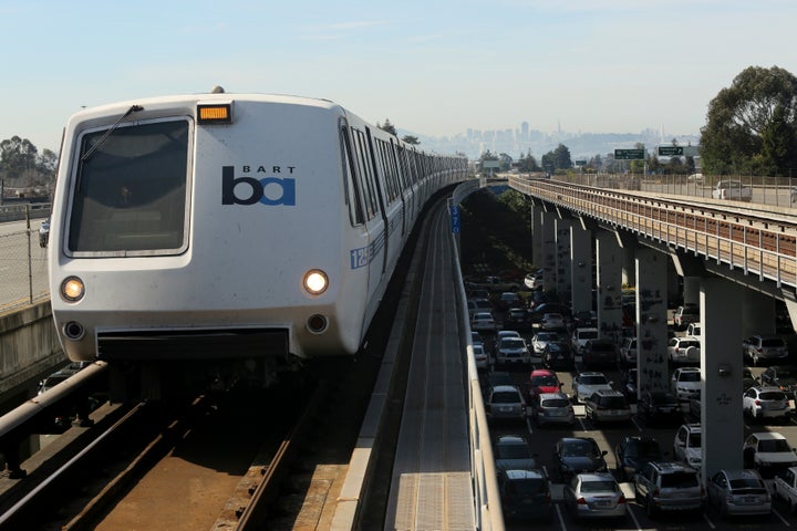 A Bay Area Rapid Transit (BART) train enters the platform area at the Rockridge station in Oakland, California.