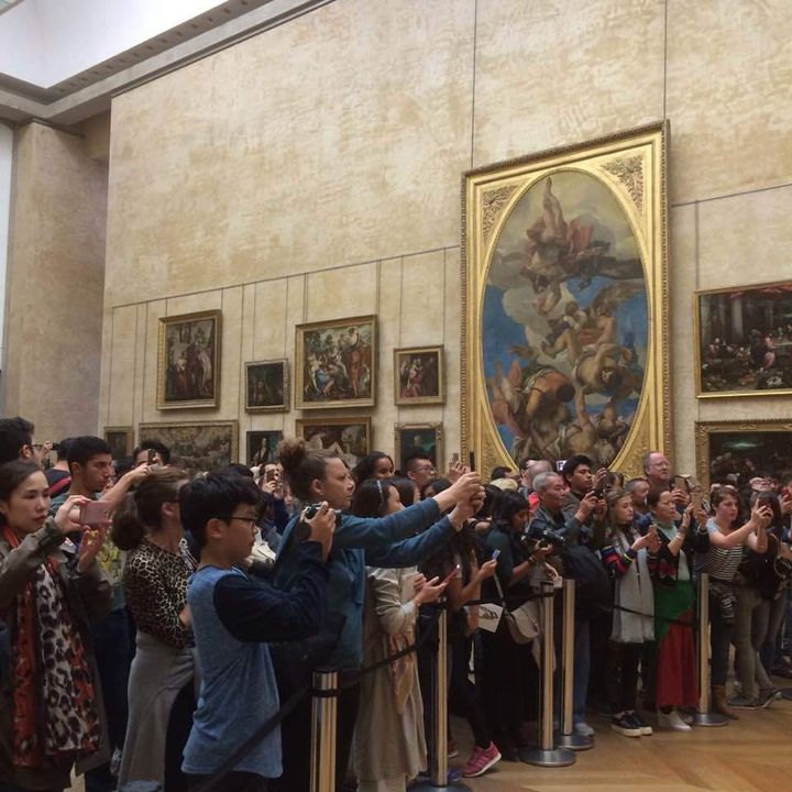 Photographing the Mona Lisa at the Louvre, Paris