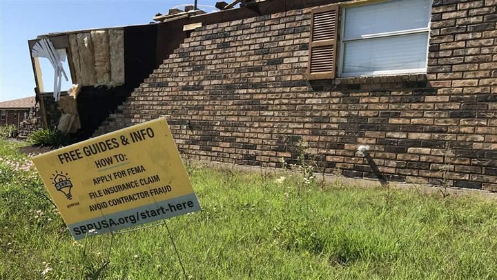 SBP, a nonprofit that helps homeowners rebuild after disasters, advertises its services in a New Orleans neighborhood that was hit by a tornado in February.