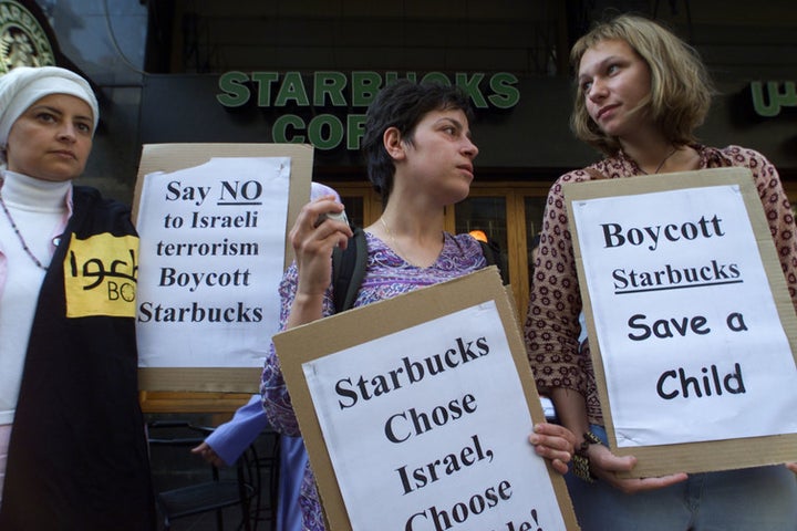 Lebanese women protests against Starbucks in 2002, accusing the US company of supporting Israel.