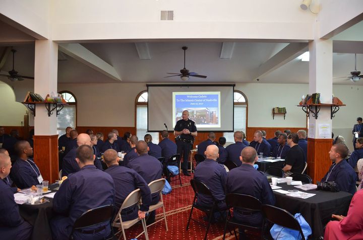 Police cadets listen to an informational session at the Islamic Center of Nashville during Ramadan.