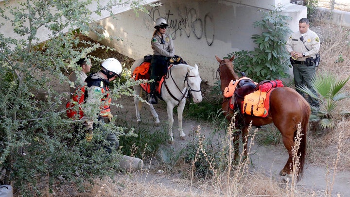 About 80 sheriff's deputies and South Pasadena police officers search Arroyo Park and the surrounding area for 5-ye