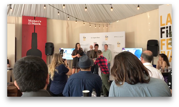 <p>Artist Shofela Coker accepts this year’s Documentary Award at the LA Film Festival.</p>