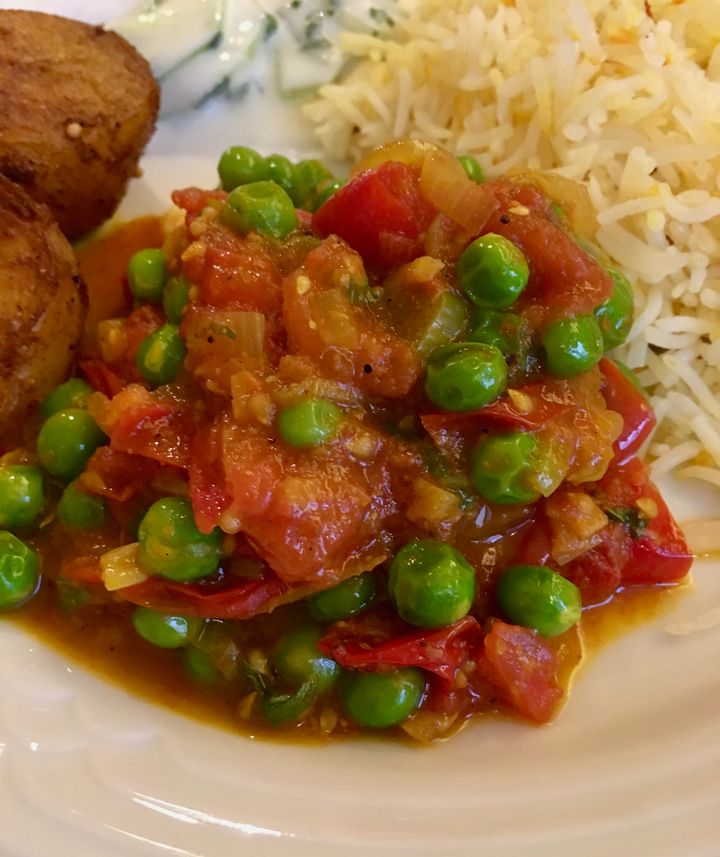 Summer tomato and pea curry is reminiscent of mattar paneer, but without the cheese