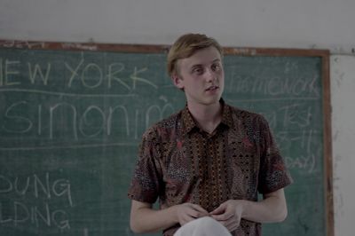 Peter (Jacob McCarthy) is an ESL teacher in a scene from Pria 