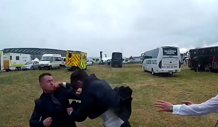 Tommy Robinson has been caught on video fighting another man at Royal Ascot