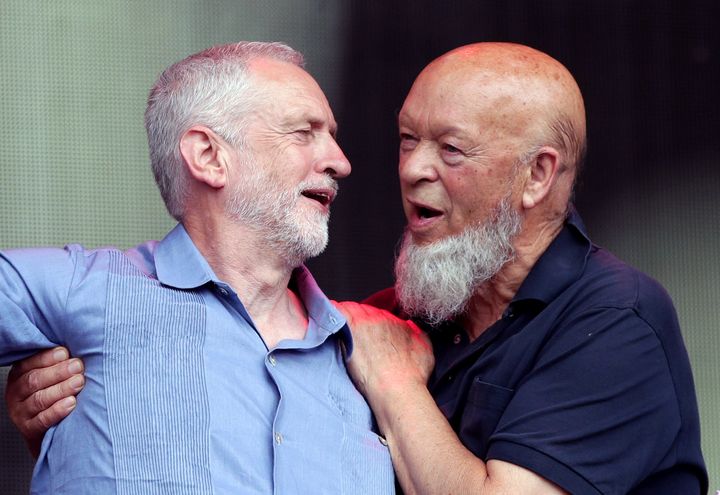Jeremy Corbyn and event organiser Michael Eavis speak to the crowd from the Pyramid stage at Glastonbury Festival