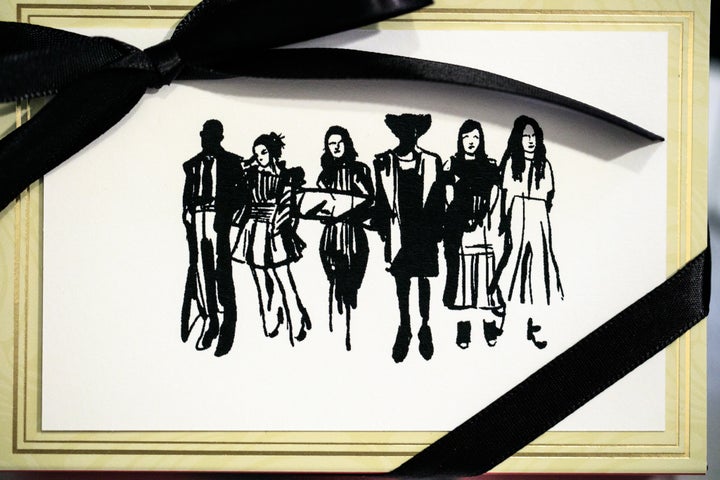 <p>Party favors, chocolate truffles, with likeness of designers in residence at An Evening with André Leon Talley by the Saint Louis Fashion Fund.</p>