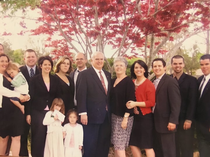 Roussel said the photo is a tribute to her late father, pictured above with his wife, children and oldest grandkids.