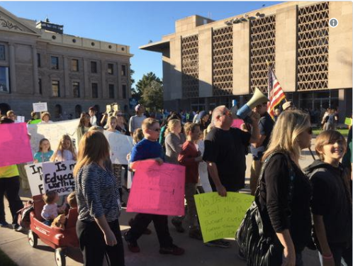 Protesting education budget cuts at Arizona state capital.