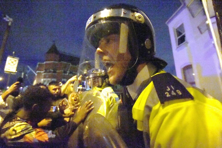 Police officers in Forest Gate during the process 