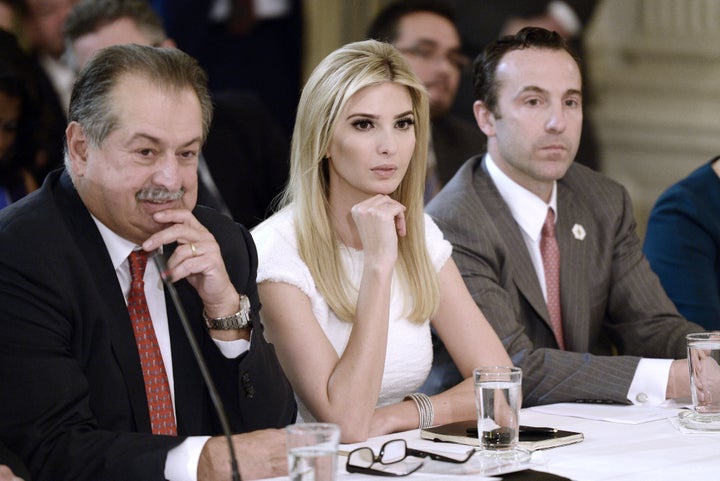 Andrew Liveris, chairman and chief executive officer of Dow Chemical, with Ivanka Trump and Reed Cordish, White House assistant of intragovernmental and technology initiatives, during a meeting with Trump, not pictured, and manufacturing executives at the White House on Feb. 23, 2017.