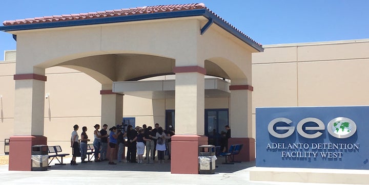 A group of faith leaders pray outside of the Adelanto Detention Facility on Tuesday, June 20, shortly before the lockdown. 