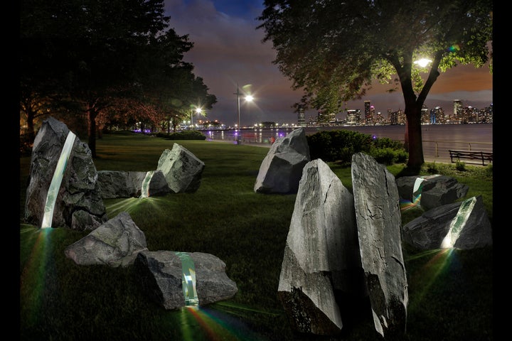 Some of the nine boulders will be bisected with a "laminated, borosilicate-glass" to create rainbow patterns. 