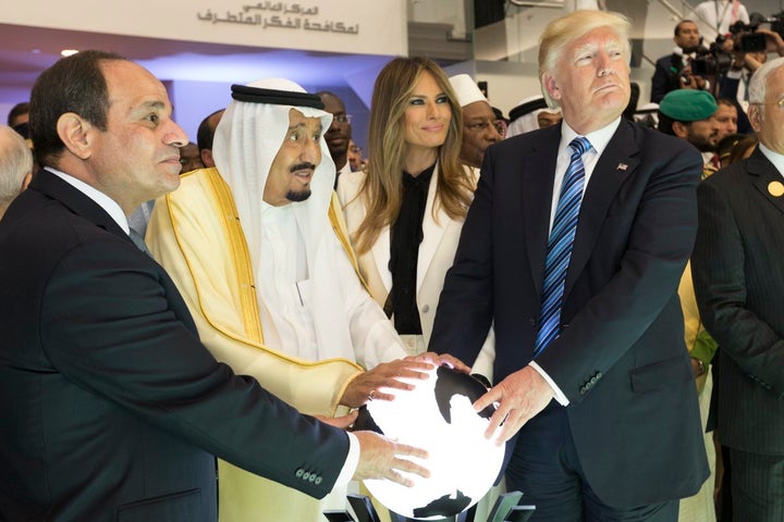 Trump stands alongside King Salman bin Abdulaziz Al Saud of Saudi Arabia, and the President of Egypt, Abdel Fattah Al Sisi.