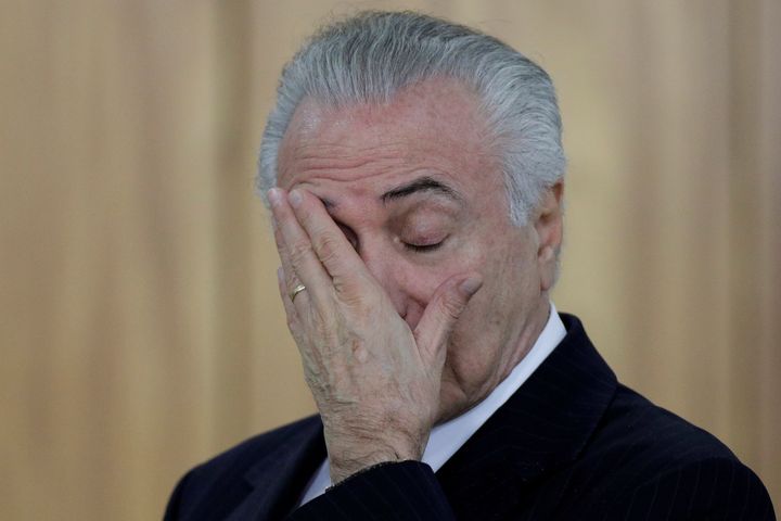 Brazilian President Michel Temer reacts during a credentials presentation ceremony. 