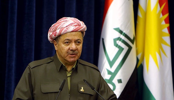 Iraqi Kurdistan Region's President Massoud Barzani, attending a news conference with Britain's Foreign Secretary Philip Hammo